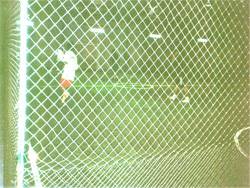 Futsal courts in Melaka with players.