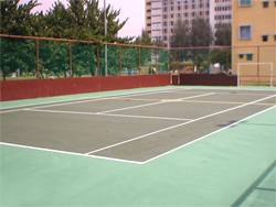 Futsal court lines and tennis court lines drawn in the same court.