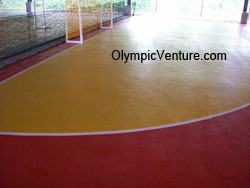 Red yellow Olymflex rubberized futsal court