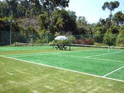 Forrest view of two tennis courts using synthetic turf for Datai Golf and Country Club in Langkawi, Kedah, Malaysia.