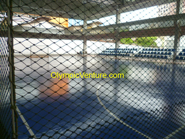 Olymflex seamless fibre-reinforced PU membrane system blue rubberized futsal floor for Tenaga Nasional Berhad