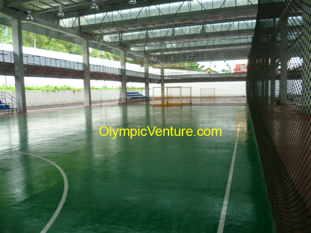 Olymflex seamless fibre-reinforced PU membrane system green rubberized futsal court for Tenaga Nasional Berhad